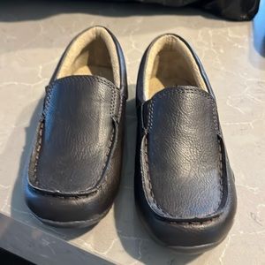 Dark brown loafers.